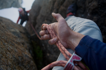 man who holds a rope