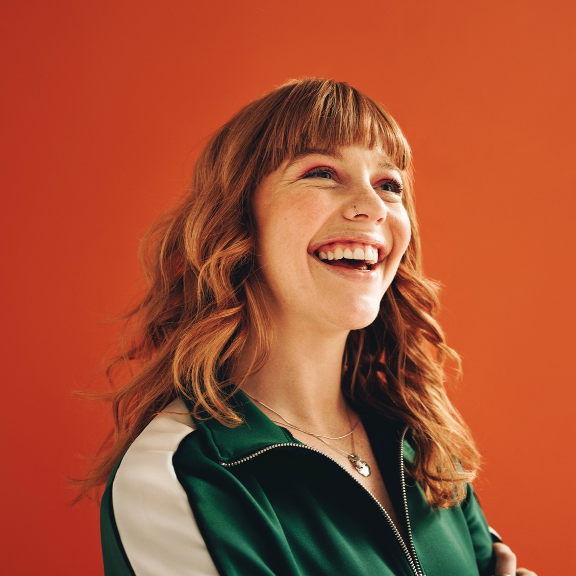 Red hair woman smiling