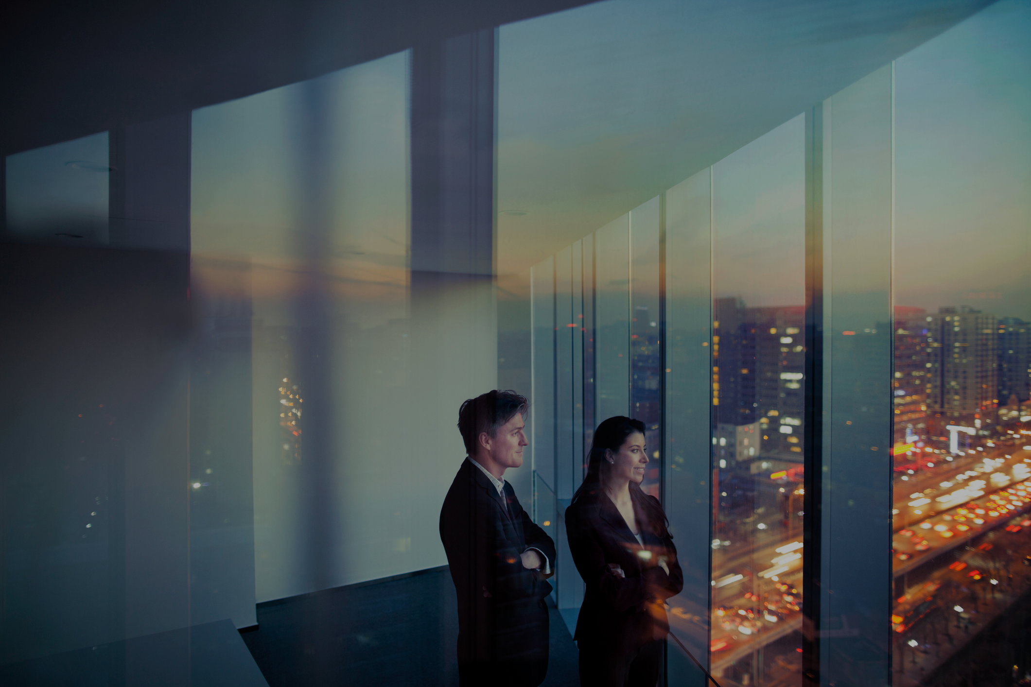 people looking at a window