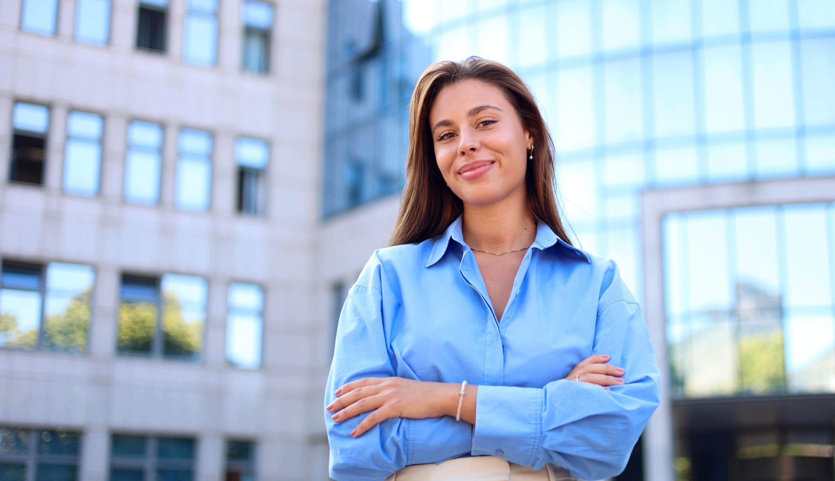 Woman smiling with a blue shirt