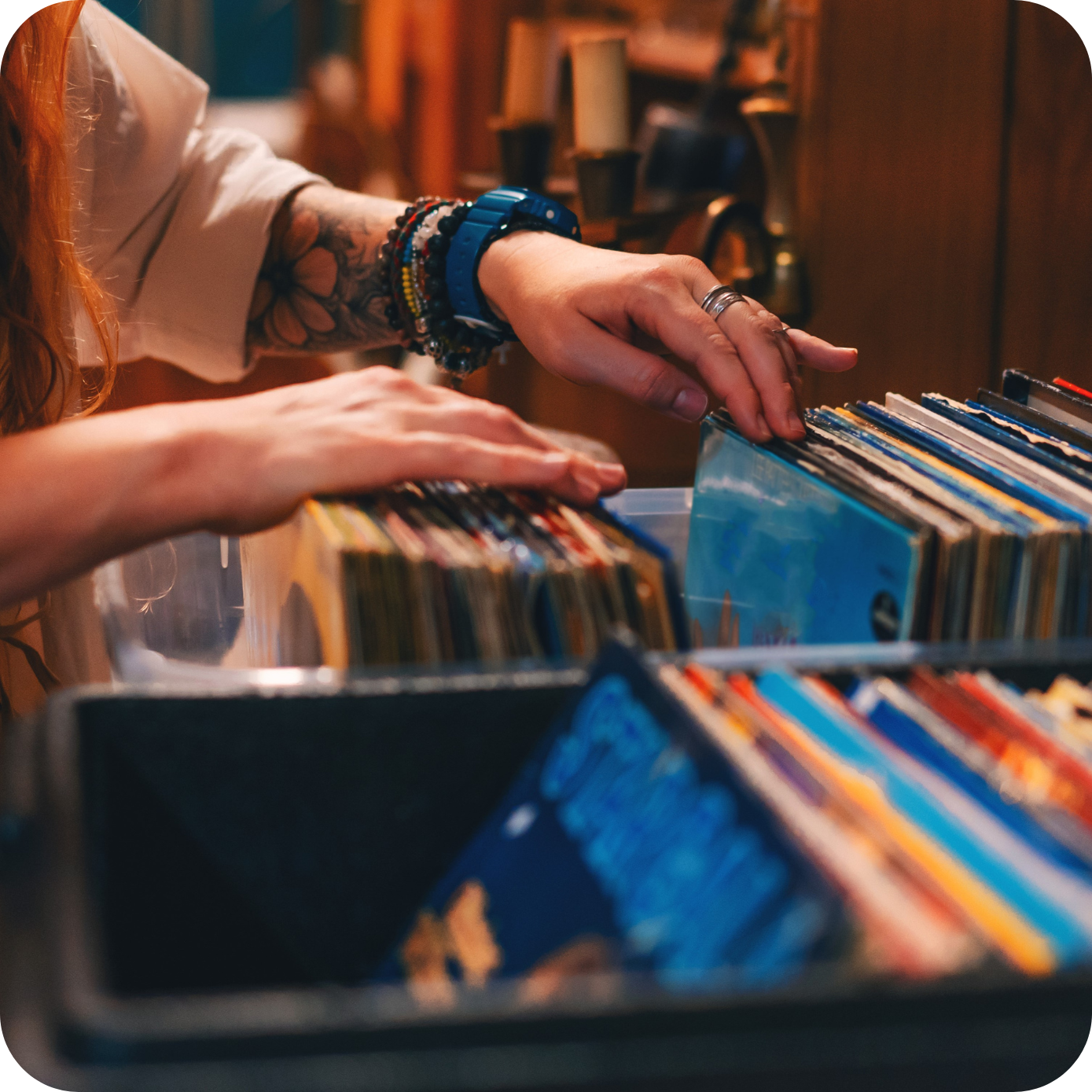 woman's hand looking for vinyls